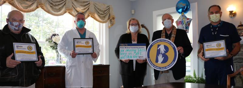Debbie and Ed Fitzpatrick celebrated the excellent care they received by making a donation to Beebe Medical Foundation. Shown are (l-r) Dr. Gary Raffel, Dr. Michael Sofronski, Debbie and Ed Fitzpatrick, and Dr. Ramon Rosa. SUBMITTED PHOTO